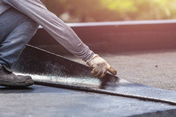 Professional Waterproofing technician working in Woodbury, NJ